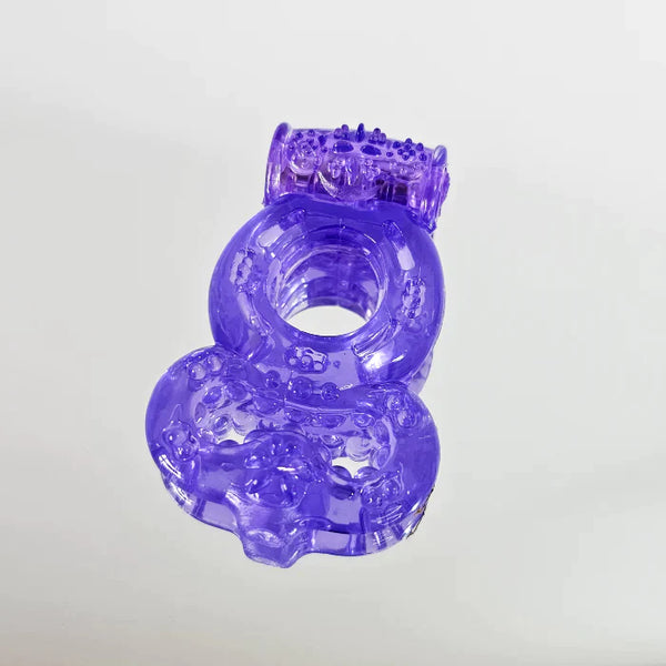 ANILLO VIBRADOR CON AMARRE DE TESTICULOS MORADO